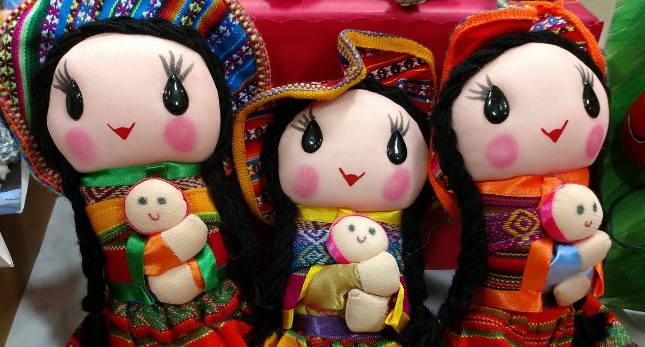 dolls holding doll babies
